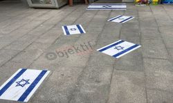 Hakkari'de bir esnaf İsrail bayraklarını yere serdi